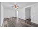 Bright living room with laminate flooring and neutral paint, providing a clean and spacious environment at 46 Hawkins Store Nw Rd, Kennesaw, GA 30144