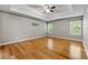 Large bedroom featuring hardwood floors, and plenty of natural light at 6687 Hill Creek Cv, Lithonia, GA 30058