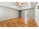 Expansive primary suite with hardwood floors and tray ceiling at 6687 Hill Creek Cv, Lithonia, GA 30058