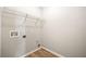 Utility room with overhead shelving at 6687 Hill Creek Cv, Lithonia, GA 30058