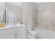 Bathroom featuring a shower-tub combination, sleek fixtures, and a clean, modern design at 243 Commons Ave, Woodstock, GA 30188