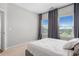 Bright bedroom featuring neutral colors, large windows, and ample space for relaxation and comfort at 243 Commons Ave, Woodstock, GA 30188