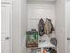 Well-organized entryway with built-in storage and coat hooks, ideal for keeping the home tidy at 243 Commons Ave, Woodstock, GA 30188