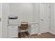 Functional home office space with built-in desk and storage at 243 Commons Ave, Woodstock, GA 30188