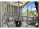 Relaxing outdoor patio with hanging egg chairs at 243 Commons Ave, Woodstock, GA 30188