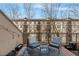 Balcony with comfortable rocking chairs offering views of the neighborhood and greenery at 3475 Oak Valley Rd # 130, Atlanta, GA 30326