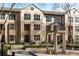 Beautiful townhome featuring meticulously maintained landscaping and a charming outdoor gazebo at 3475 Oak Valley Rd # 130, Atlanta, GA 30326
