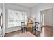 Bright breakfast nook with natural light, hardwood floors, a table with chairs, and stainless steel appliances at 3475 Oak Valley Rd # 130, Atlanta, GA 30326
