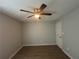 Bedroom featuring hardwood floors, neutral wall color, and ceiling fan at 4884 Browns Mill Ferry Rd, Lithonia, GA 30038
