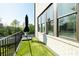 Cozy outdoor balcony with artificial grass and black railing at 6666 Sterling Dr, Sandy Springs, GA 30328