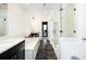 Modern bathroom features a soaking tub and glass-enclosed shower with black tile flooring at 6666 Sterling Dr, Sandy Springs, GA 30328