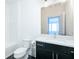 Bathroom with white vanity, shower and tub combo, offering a relaxing experience at 6666 Sterling Dr, Sandy Springs, GA 30328