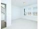 Empty room with neutral carpet and paint, offering versatility and endless possibilities at 6666 Sterling Dr, Sandy Springs, GA 30328