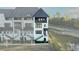Beautiful, modern townhouse with white and black accents and a balcony overlooking the street at 6666 Sterling Dr, Sandy Springs, GA 30328