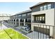 Townhome features balcony, garage, and modern architecture at 6666 Sterling Dr, Sandy Springs, GA 30328