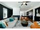 Open concept living room with kitchen and seating area in background at 6666 Sterling Dr, Sandy Springs, GA 30328