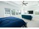 A serene main bedroom featuring a large bed, comfortable couch, and ample natural light at 6666 Sterling Dr, Sandy Springs, GA 30328