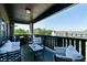 Covered patio featuring comfortable seating area overlooking neighborhood landscape at 6666 Sterling Dr, Sandy Springs, GA 30328
