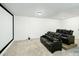 Home theater room with plush seating, carpet, and ready for movie nights with a large screen at 6666 Sterling Dr, Sandy Springs, GA 30328