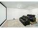 Home theater features plush seating and large screen, perfect for Gathering movie nights at 6666 Sterling Dr, Sandy Springs, GA 30328