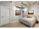 Relaxing bedroom featuring exposed ductwork and a view of exterior artwork at 805 Peachtree Ne St # 220, Atlanta, GA 30308
