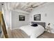 Bright bedroom featuring a large window, ceiling fan, and stylish decor at 805 Peachtree Ne St # 220, Atlanta, GA 30308