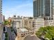 Elevated city view of the apartment complex with a pool and surrounding buildings and streets at 805 Peachtree Ne St # 220, Atlanta, GA 30308