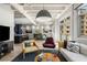Comfortable living room with stylish seating and an open layout to the dining area and modern kitchen at 805 Peachtree Ne St # 220, Atlanta, GA 30308