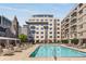 Beautiful community pool surrounded by lounge chairs and manicured landscaping, perfect for relaxation at 805 Peachtree Ne St # 220, Atlanta, GA 30308