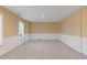 Spacious basement area features carpeting, windows, and ample space for entertainment at 861 Southland Pass, Stone Mountain, GA 30087
