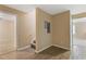 Hallway entrance features hardwood floors and leads to stairs and other rooms at 861 Southland Pass, Stone Mountain, GA 30087