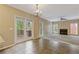 Spacious living room with fireplace and sliding glass doors to a deck at 861 Southland Pass, Stone Mountain, GA 30087