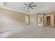 Spacious main bedroom features a tray ceiling with fan and neutral walls at 861 Southland Pass, Stone Mountain, GA 30087