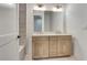 Bright bathroom with double sink vanity, stone tiling and white walls at 140 Rolison Way, Fayetteville, GA 30214