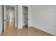 Bedroom features hardwood floors and a closet with an open door at 140 Rolison Way, Fayetteville, GA 30214