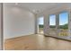A bedroom with hardwood floors and access to the outside at 140 Rolison Way, Fayetteville, GA 30214