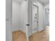 Hallway featuring hardwood floors and neutral walls at 140 Rolison Way, Fayetteville, GA 30214