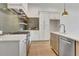 Modern kitchen with stainless steel appliances and dark tile backsplash at 140 Rolison Way, Fayetteville, GA 30214