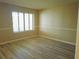 Inviting bedroom with neutral walls and updated flooring, perfect for relaxation at 296 Country Club Dr, Jonesboro, GA 30238