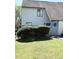 Charming two-story home features a well-maintained lawn and attractive landscaping at 296 Country Club Dr, Jonesboro, GA 30238