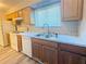 Functional kitchen features updated countertops and a stainless steel sink at 296 Country Club Dr, Jonesboro, GA 30238