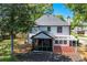 Back exterior features a screened-in porch and pergola at 4161 Sherwood Oaks Dr, Decatur, GA 30034