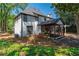 Backyard features screened-in porch and white pergola at 4161 Sherwood Oaks Dr, Decatur, GA 30034