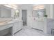 Bright bathroom boasts dual vanities, modern fixtures, and neutral finishes for a spa-like feel at 4161 Sherwood Oaks Dr, Decatur, GA 30034