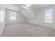Bright, carpeted bedroom with ample light features an architectural ceiling line and large windows at 4161 Sherwood Oaks Dr, Decatur, GA 30034