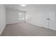 Cozy bedroom features soft carpet, double door closet and natural light from the window at 4161 Sherwood Oaks Dr, Decatur, GA 30034