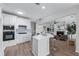 Modern kitchen with white cabinets, stainless steel appliances, and a center island with seating at 4161 Sherwood Oaks Dr, Decatur, GA 30034