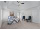 Spacious main bedroom boasts a tray ceiling, carpeting, and a ceiling fan at 4161 Sherwood Oaks Dr, Decatur, GA 30034