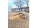 View of the backyard of a townhome with a large rock and privacy fencing at 164 Haven Oak Way, Lawrenceville, GA 30044