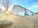 Backyard of a townhome with a privacy fence and a grassy area at 164 Haven Oak Way, Lawrenceville, GA 30044